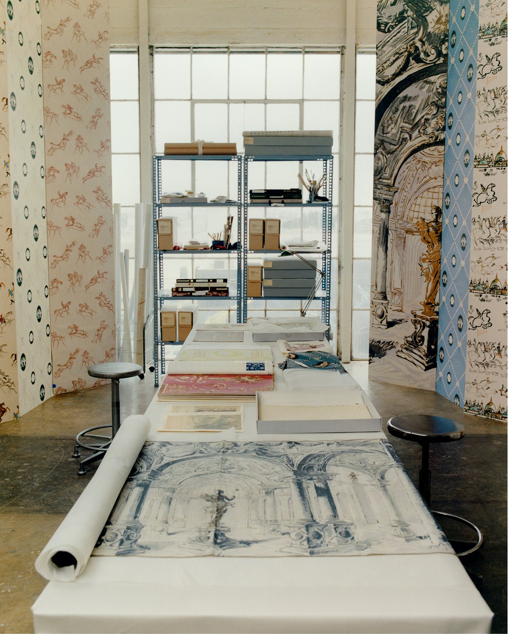 A sun-filled archival space with panels featuring ARCHIVE by BACKDROP, a new collection of wallpapers from Backdrop