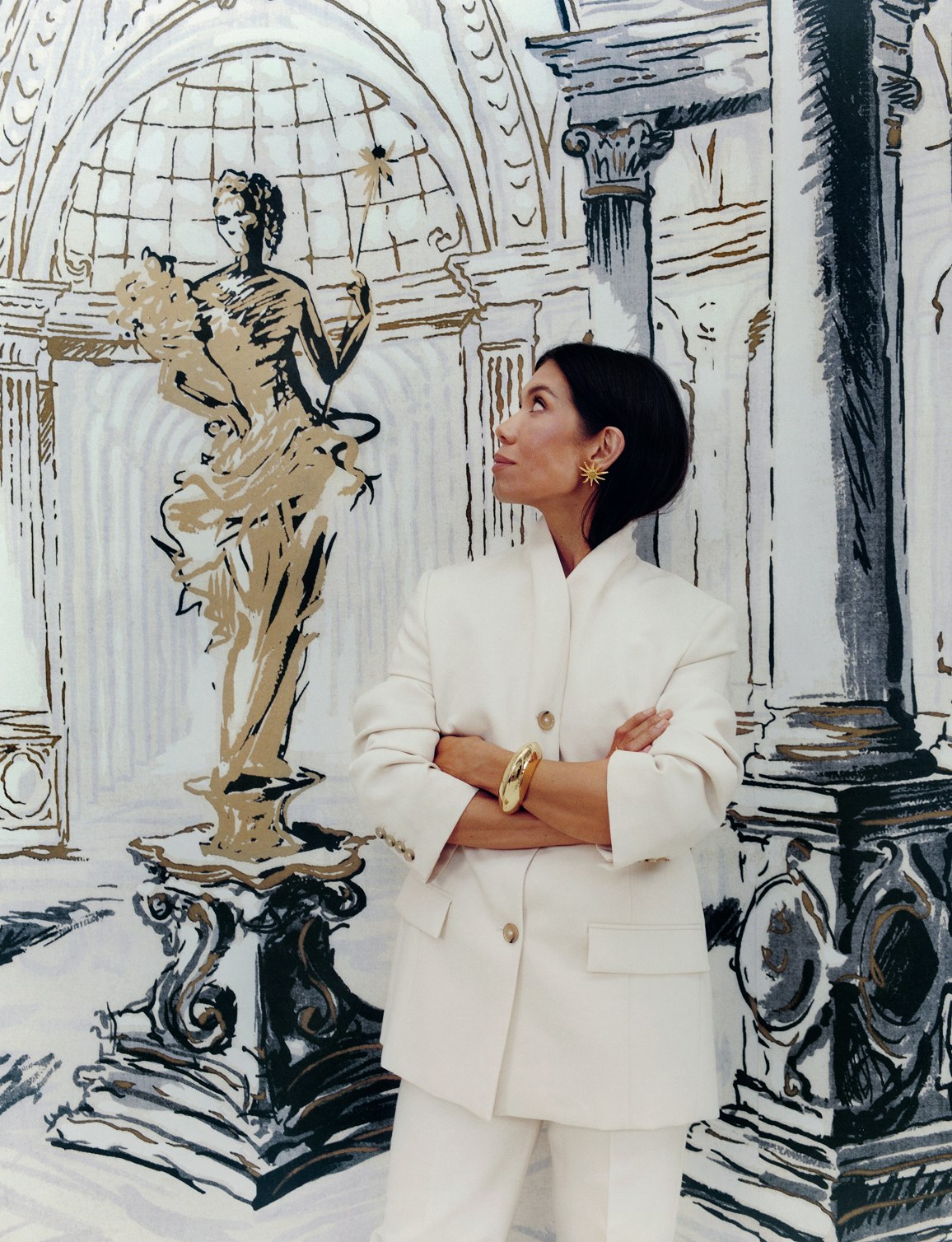 A recreation of an original Schumacher advertisement for home furnishings, featuring Backdrop's founder and the PALAZZO PANEL SET from ARCHIVE by BACKDROP