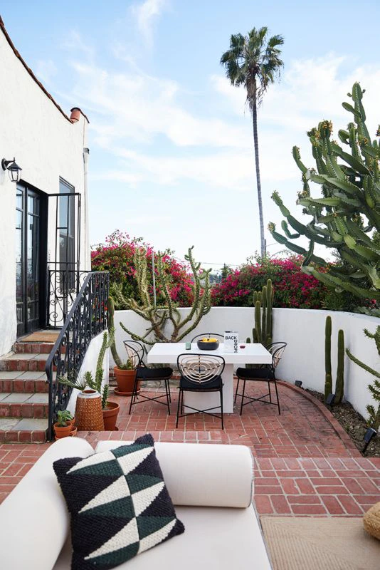 An outdoor space with a couch.
