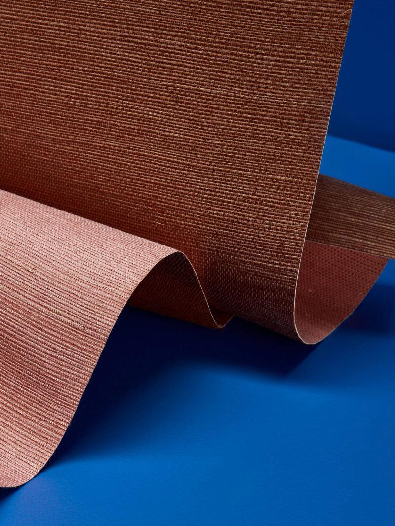 GHOST RANCH and 36 HOURS IN MARRAKESH Haruki Sisal textured wallpapers shown against a blue BACKDROP, Blue is the Coolest Color