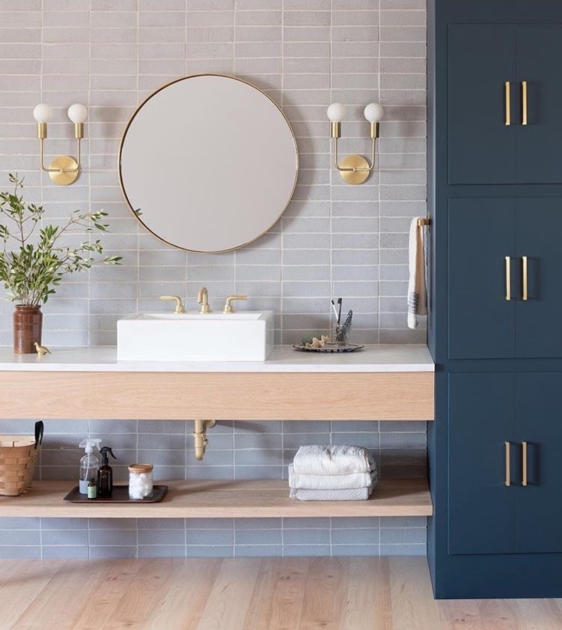 Select hero shade for cabinets to add depth and interest. Photo: @schoolhouse